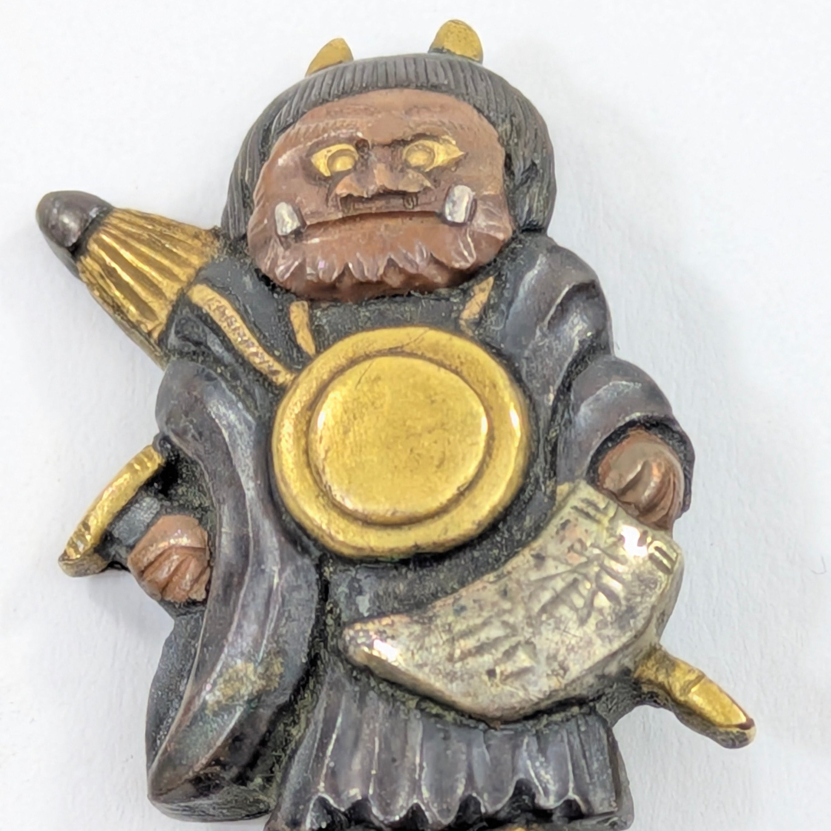 Menuki Oni Dressed as Monk with Drum and Scroll Japan, Edo period