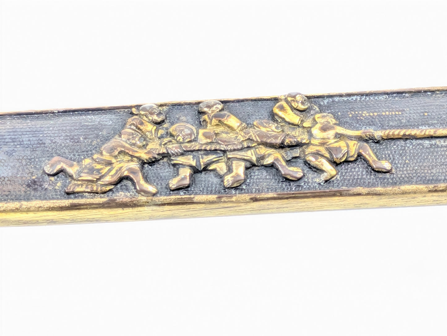 Fuchi-Kashira w/ Soldiers Pulling Cannon Japan Edo period (1603–1868) Copper Alloy w/ Gilt Details LS195