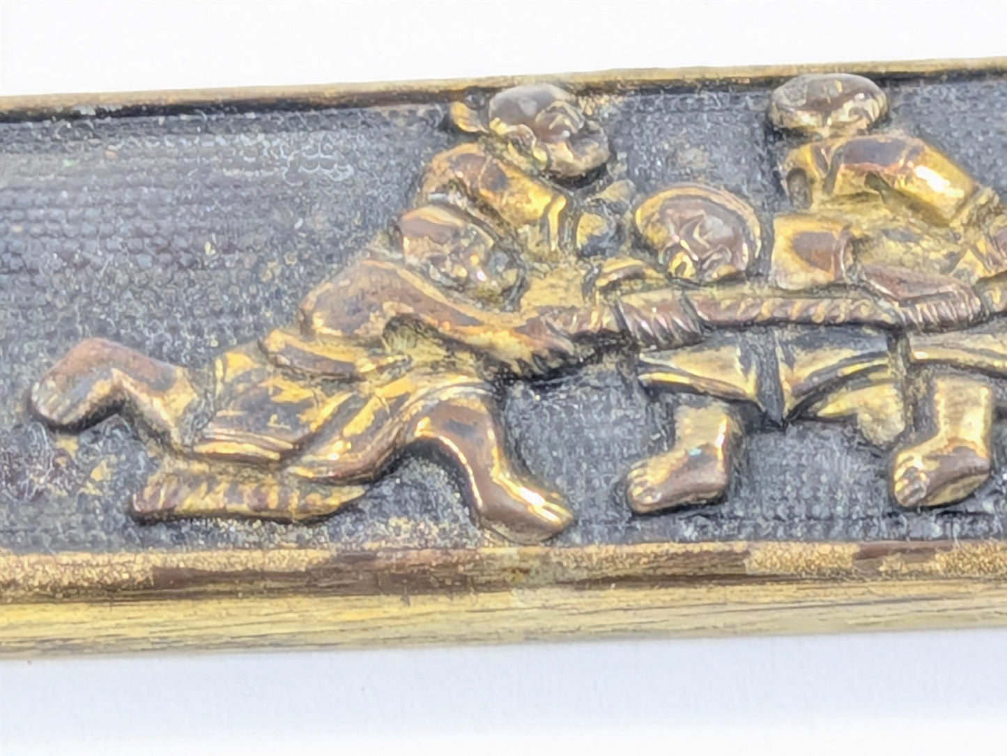 Fuchi-Kashira w/ Soldiers Pulling Cannon Japan Edo period (1603–1868) Copper Alloy w/ Gilt Details LS195