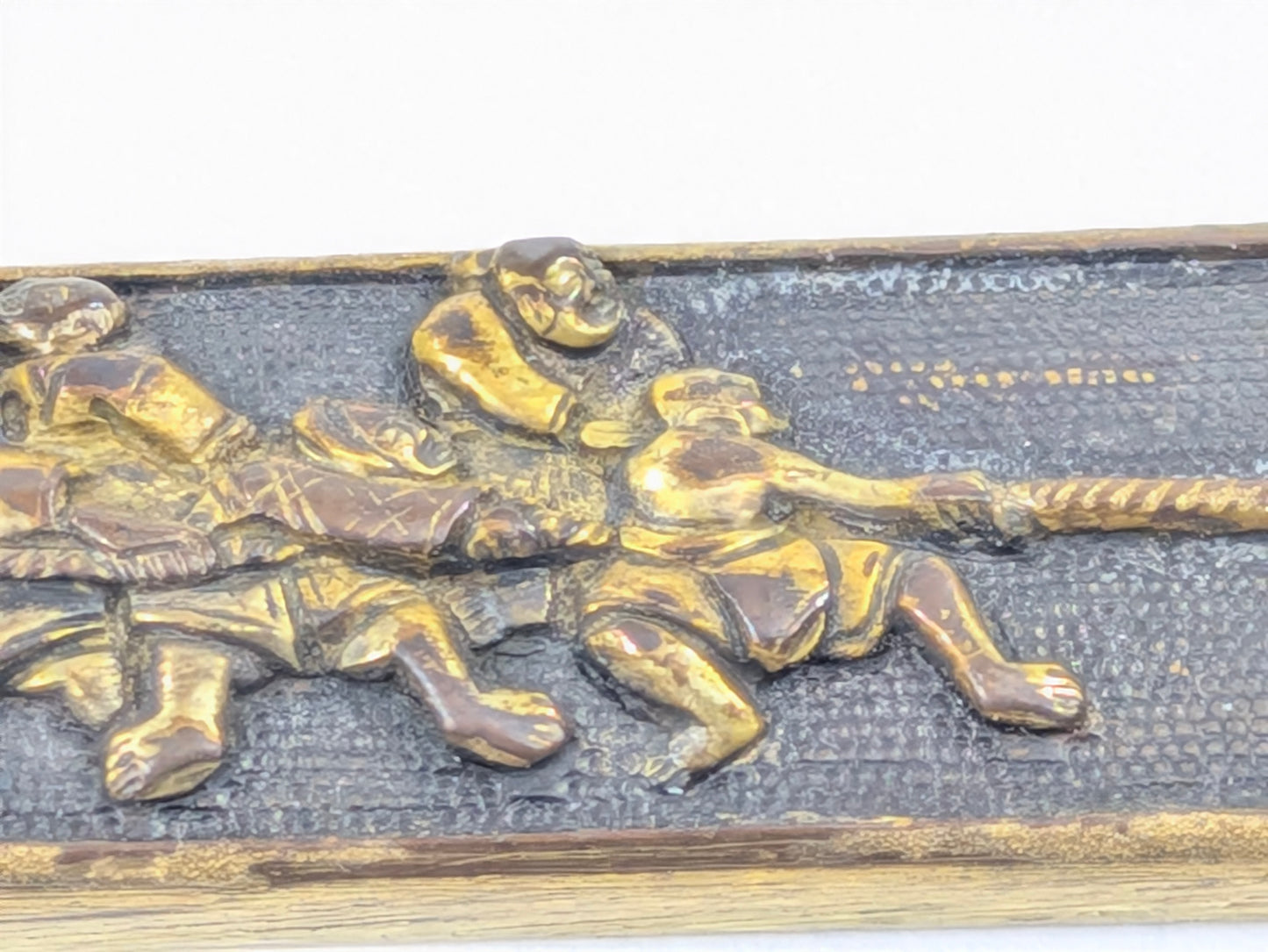 Fuchi-Kashira w/ Soldiers Pulling Cannon Japan Edo period (1603–1868) Copper Alloy w/ Gilt Details LS195