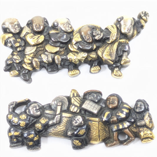 Menuki of Children at Play Japanese, Edo period (18th–19th century)  Shakudō with gold and silver details Samurai Sword Ornament  LS 072