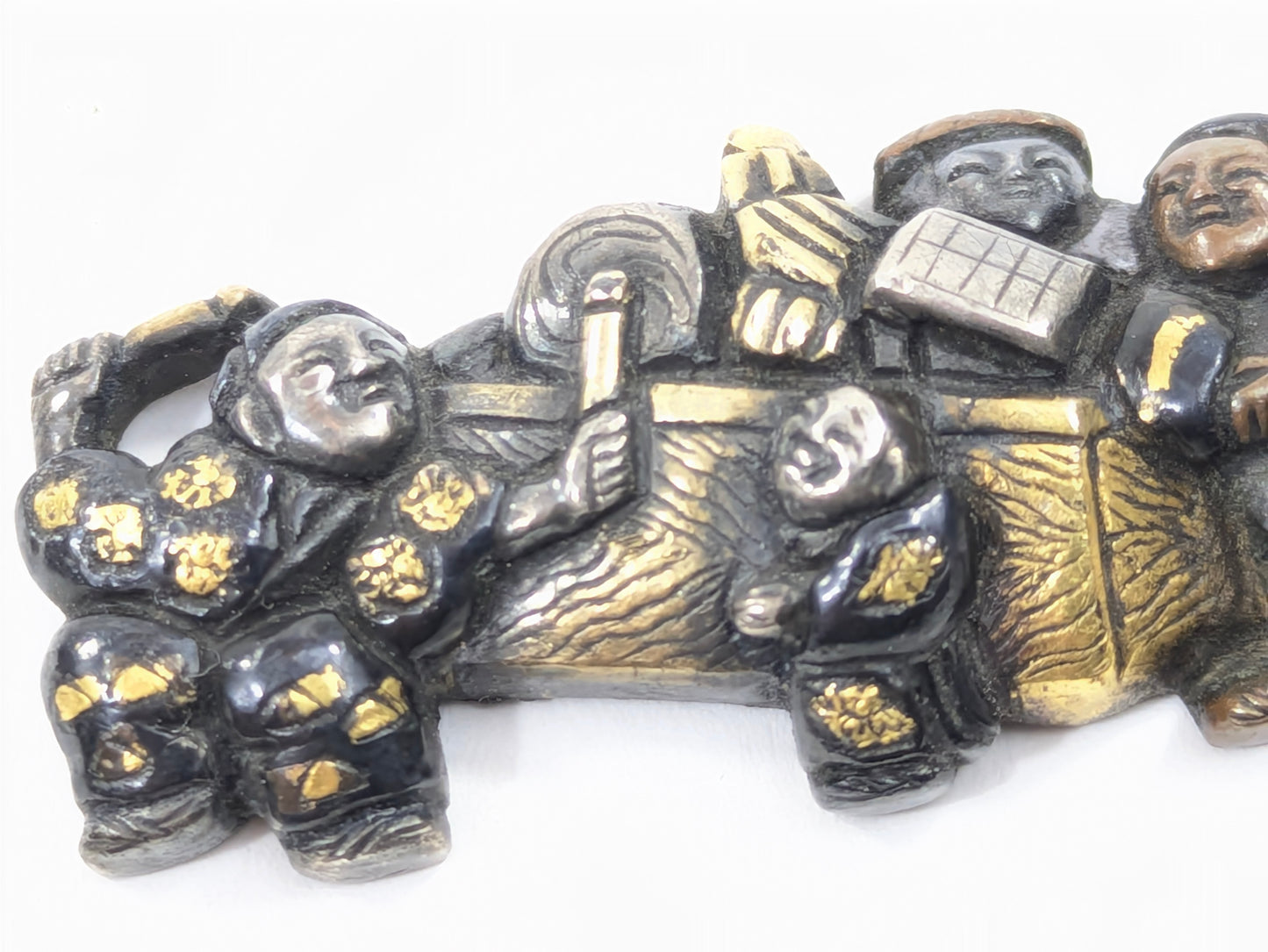 Menuki of Children at Play Japanese, Edo period (18th–19th century)  Shakudō with gold and silver details Samurai Sword Ornament  LS 072