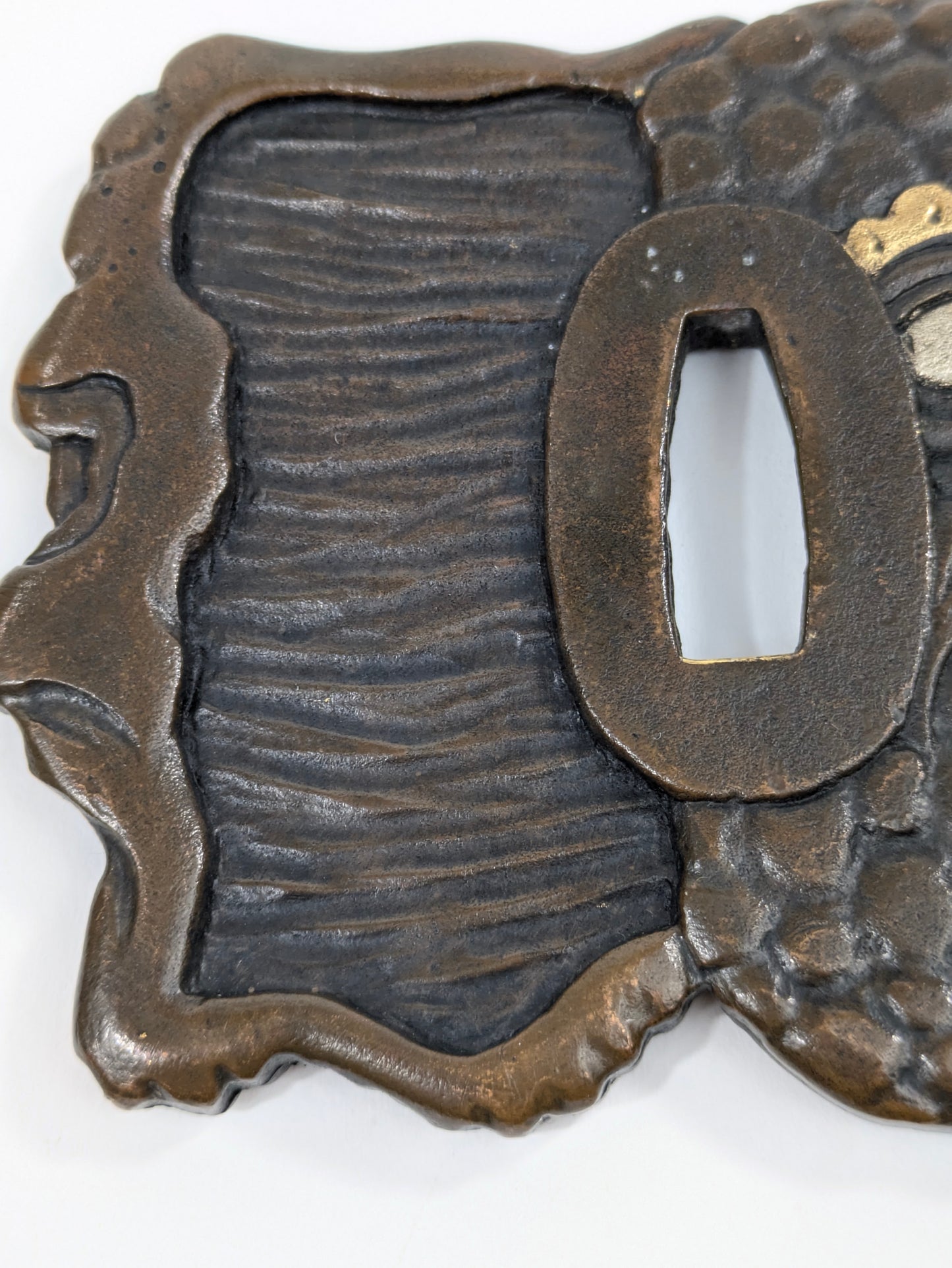 Decorative Tsuba Oni Mask Motif Japan, 20th (after Edo period) Cast iron gilt silvered details LS179