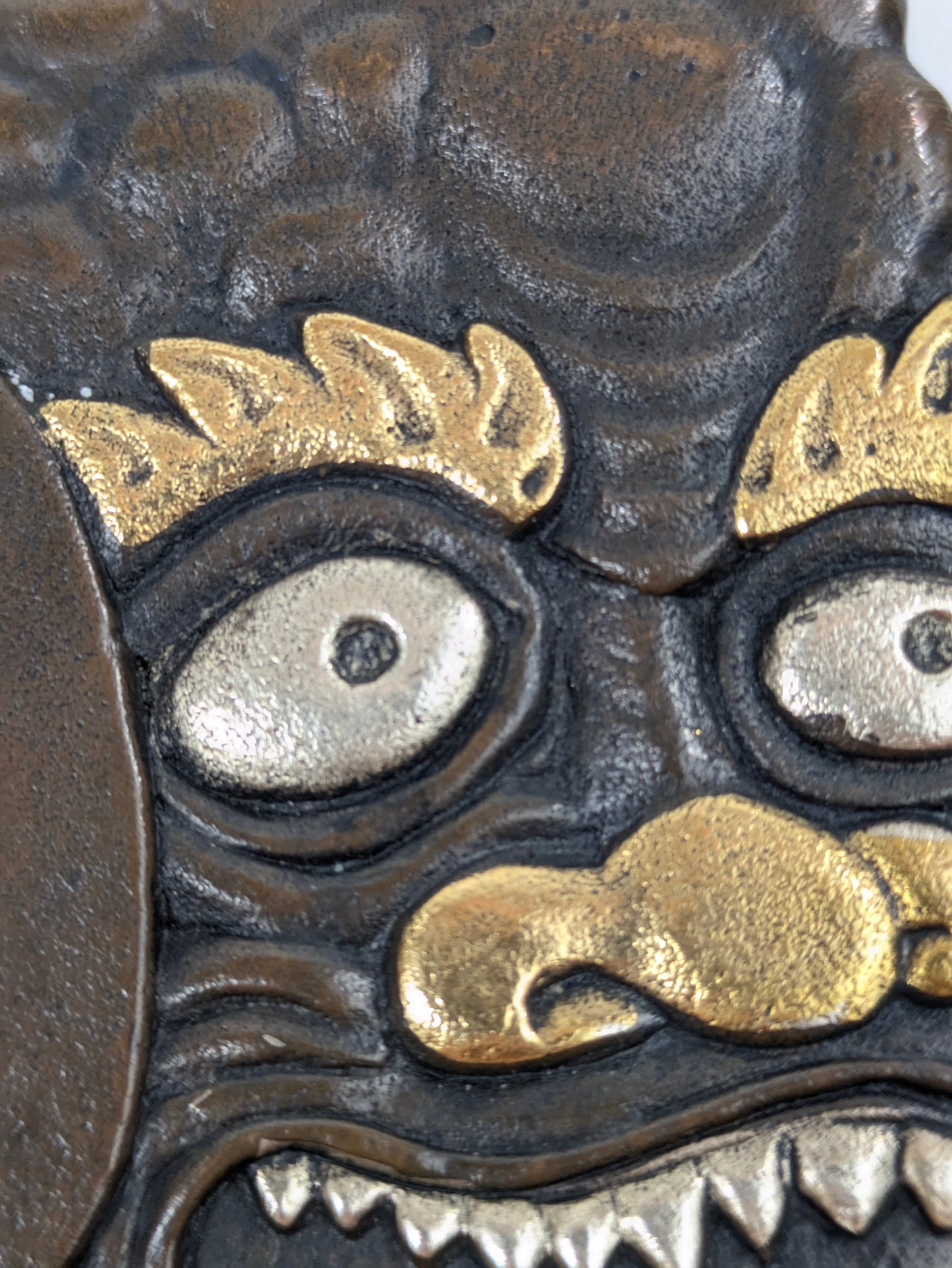 Decorative Tsuba Oni Mask Motif Japan, 20th (after Edo period) Cast iron gilt silvered details LS179