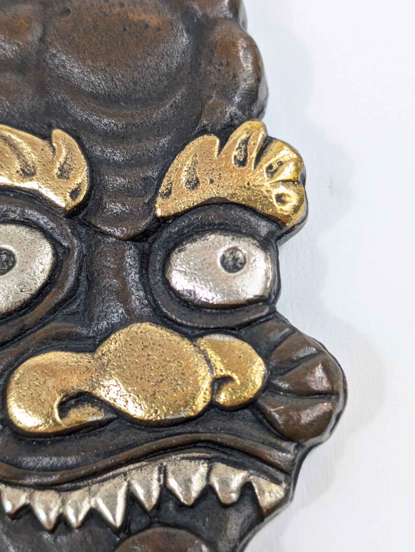 Decorative Tsuba Oni Mask Motif Japan, 20th (after Edo period) Cast iron gilt silvered details LS179