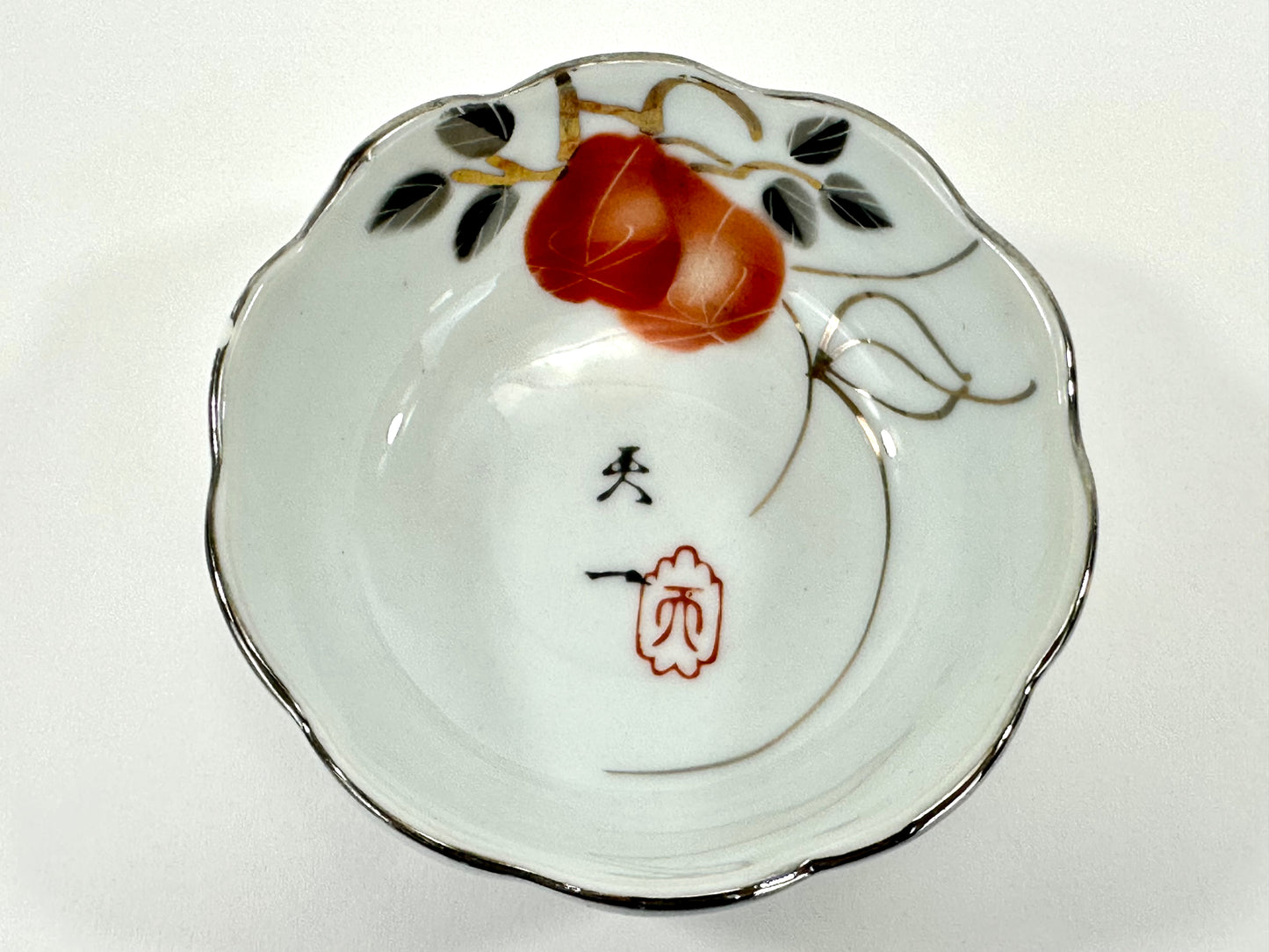 Vintage Japanese Porcelain Cup with Persimmon Motif Silver-Rimmed 3″