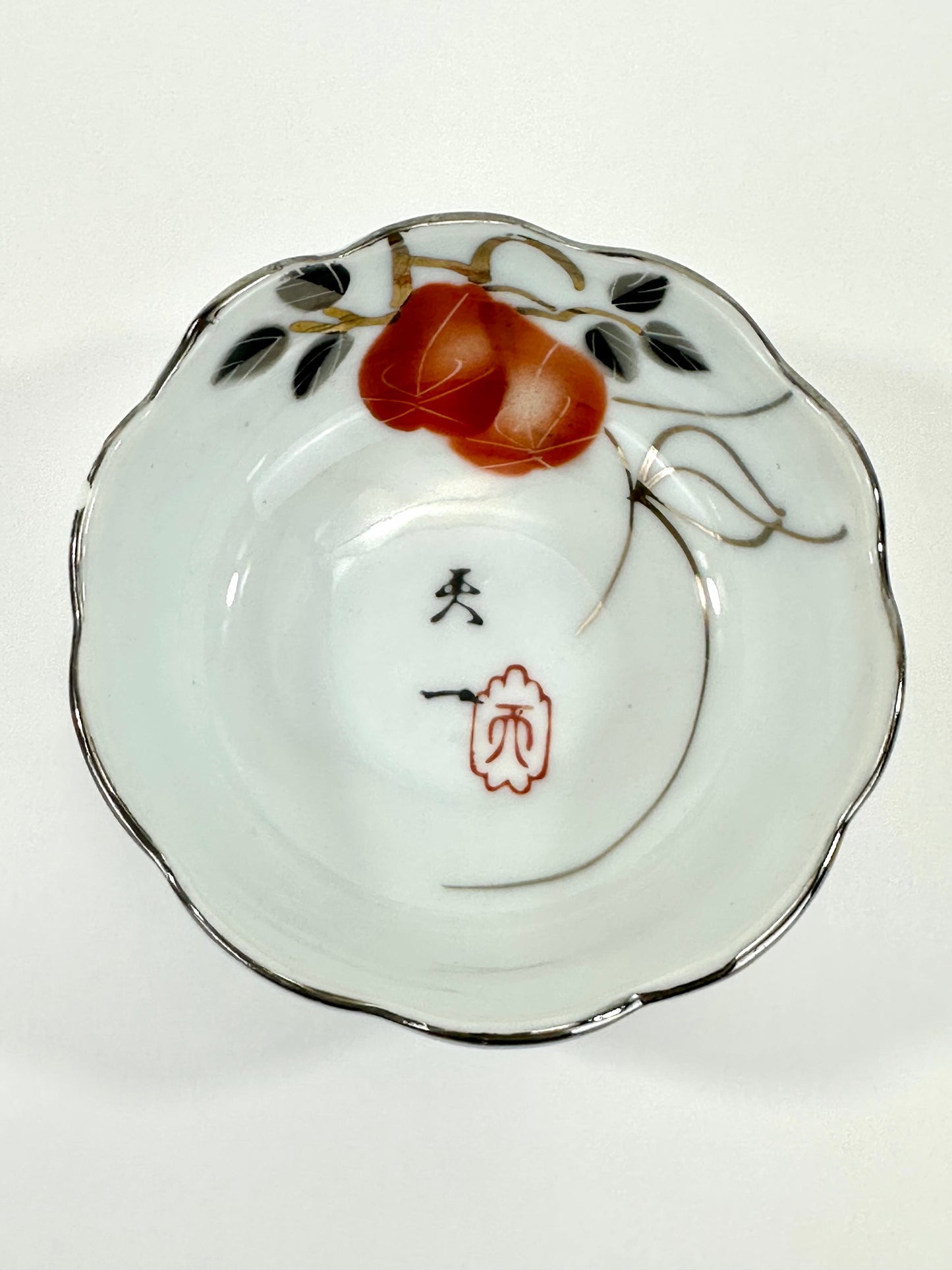 Vintage Japanese Porcelain Cup with Persimmon Motif Silver-Rimmed 3″