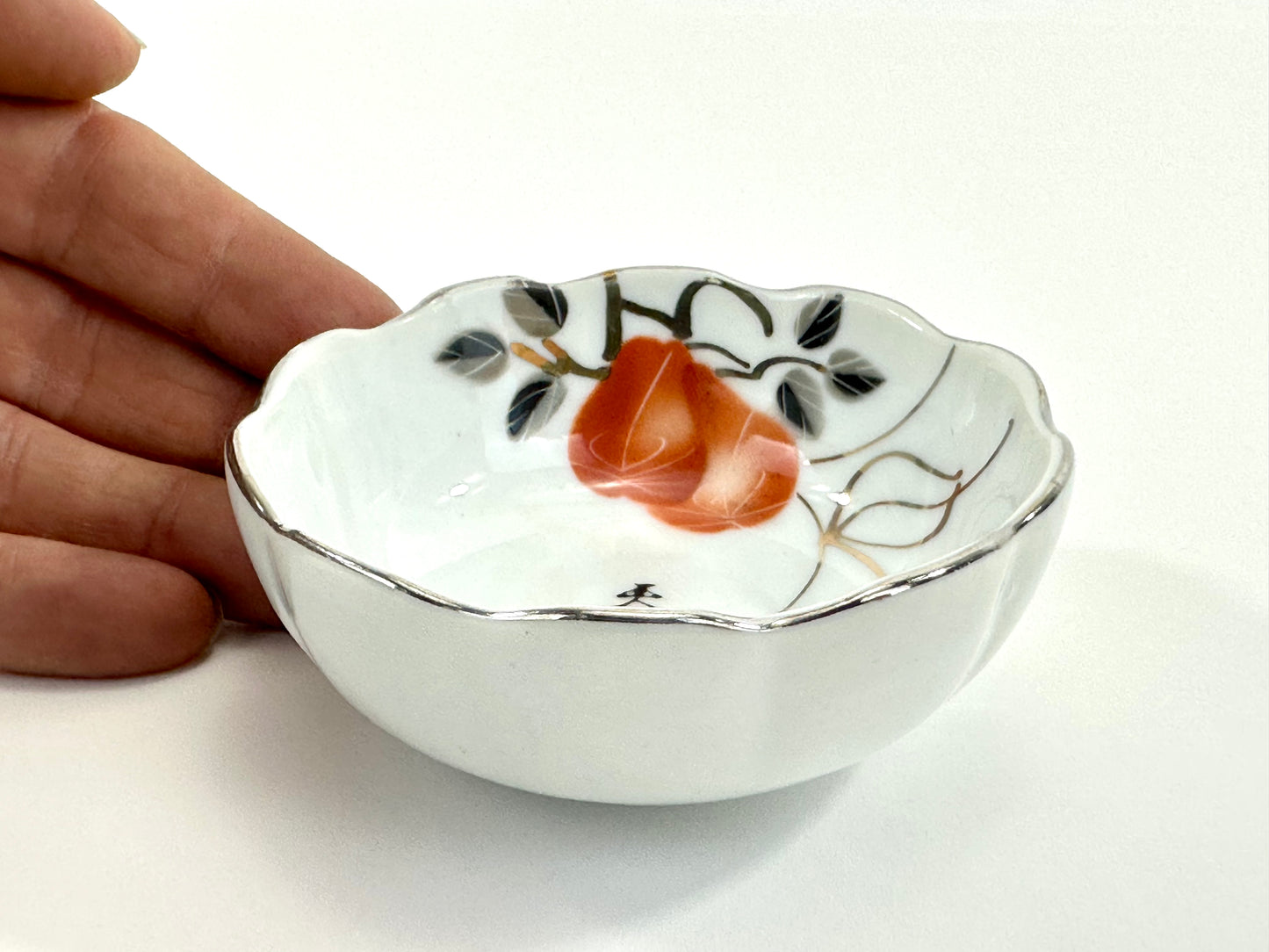 Vintage Japanese Porcelain Cup with Persimmon Motif Silver-Rimmed 3″