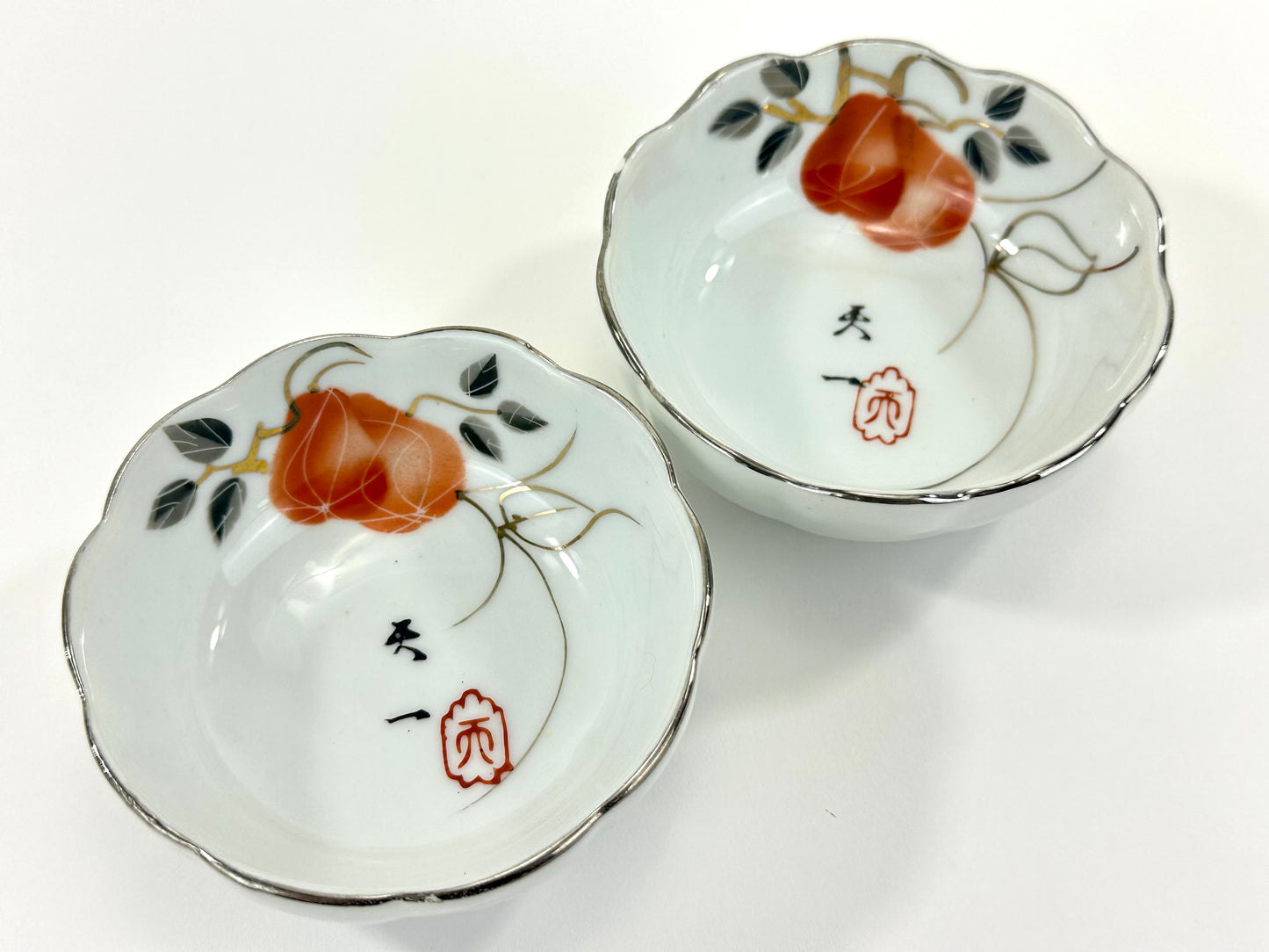 Vintage Japanese Porcelain Cup with Persimmon Motif Silver-Rimmed 3″