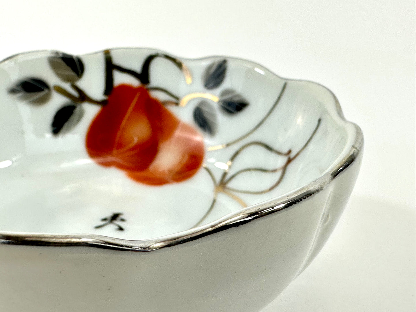 Vintage Japanese Porcelain Cup with Persimmon Motif Silver-Rimmed 3″