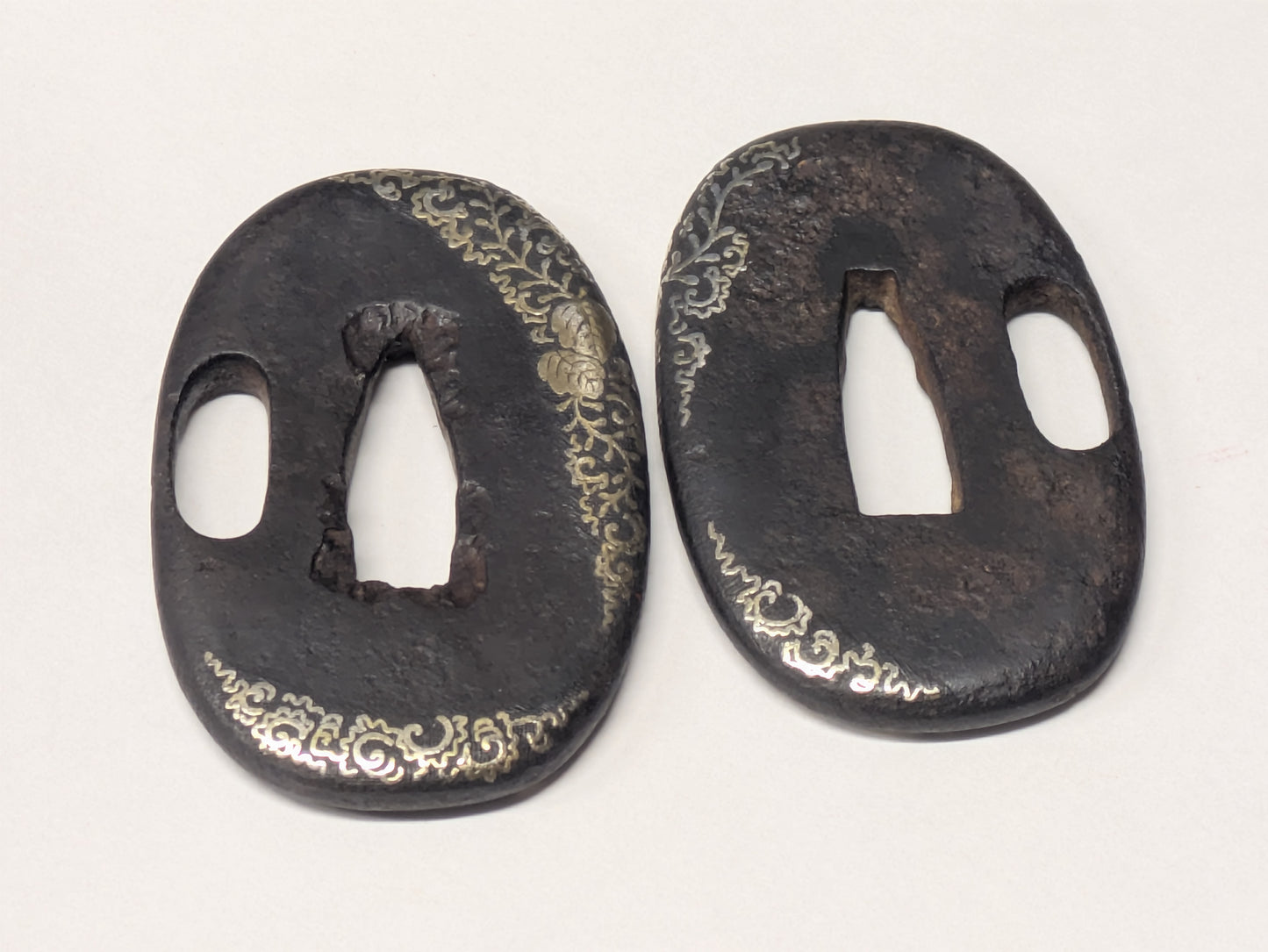 Antique Japanese Pair of Matched Iron Tsuba with Silver Wisteria Inlay, Edo Period, c. 1800–1868