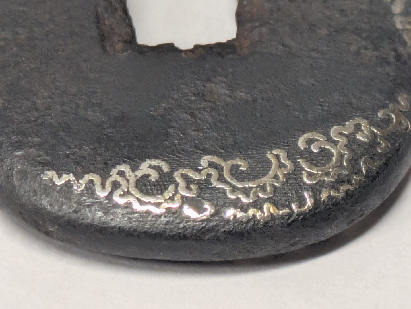 Antique Japanese Pair of Matched Iron Tsuba with Silver Wisteria Inlay, Edo Period, c. 1800–1868
