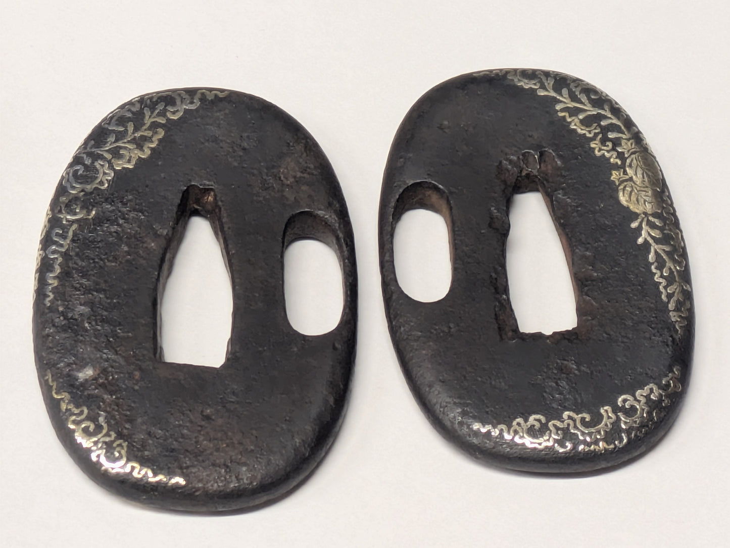 Antique Japanese Pair of Matched Iron Tsuba with Silver Wisteria Inlay, Edo Period, c. 1800–1868
