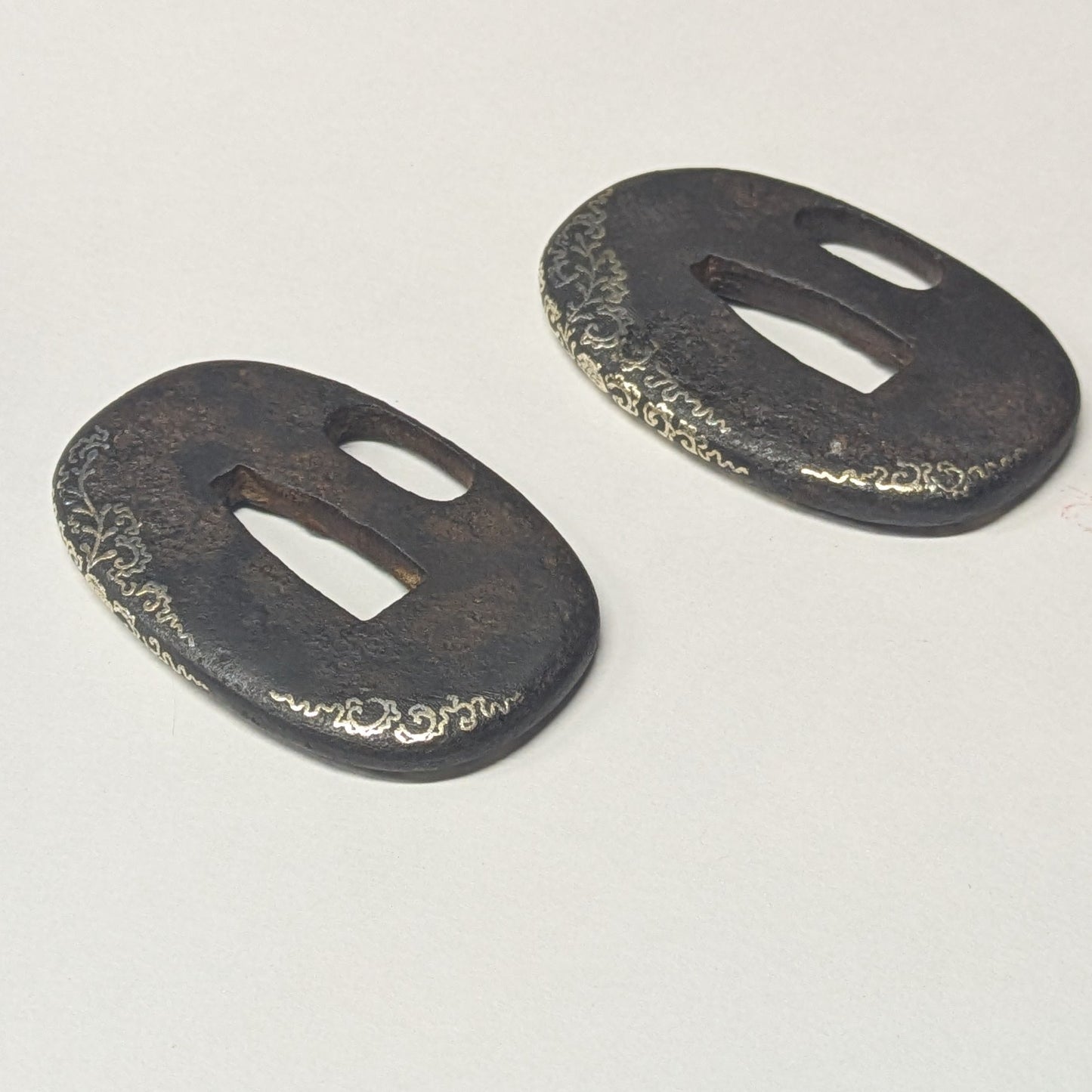 Antique Japanese Pair of Matched Iron Tsuba with Silver Wisteria Inlay, Edo Period, c. 1800–1868